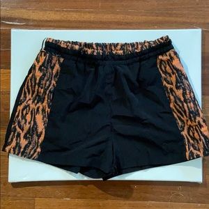 Orange and black beach shorts
